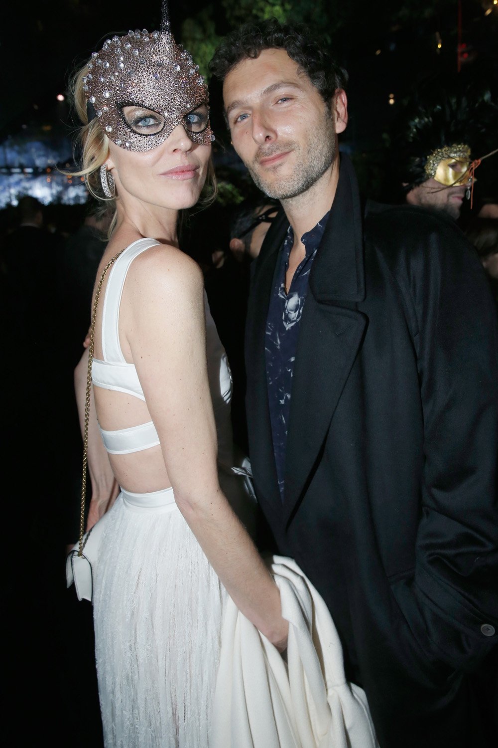 PARIS, FRANCE - JANUARY 23: Eva Herzigova and a guest attend the Christian Dior Haute Couture Spring Summer 2017 Bal Masque as part of Paris Fashion Week on January 23, 2017 in Paris, France. (Photo by Bertrand Rindoff Petroff/Getty Images for Dior) *** Local Caption *** Eva Herzigova